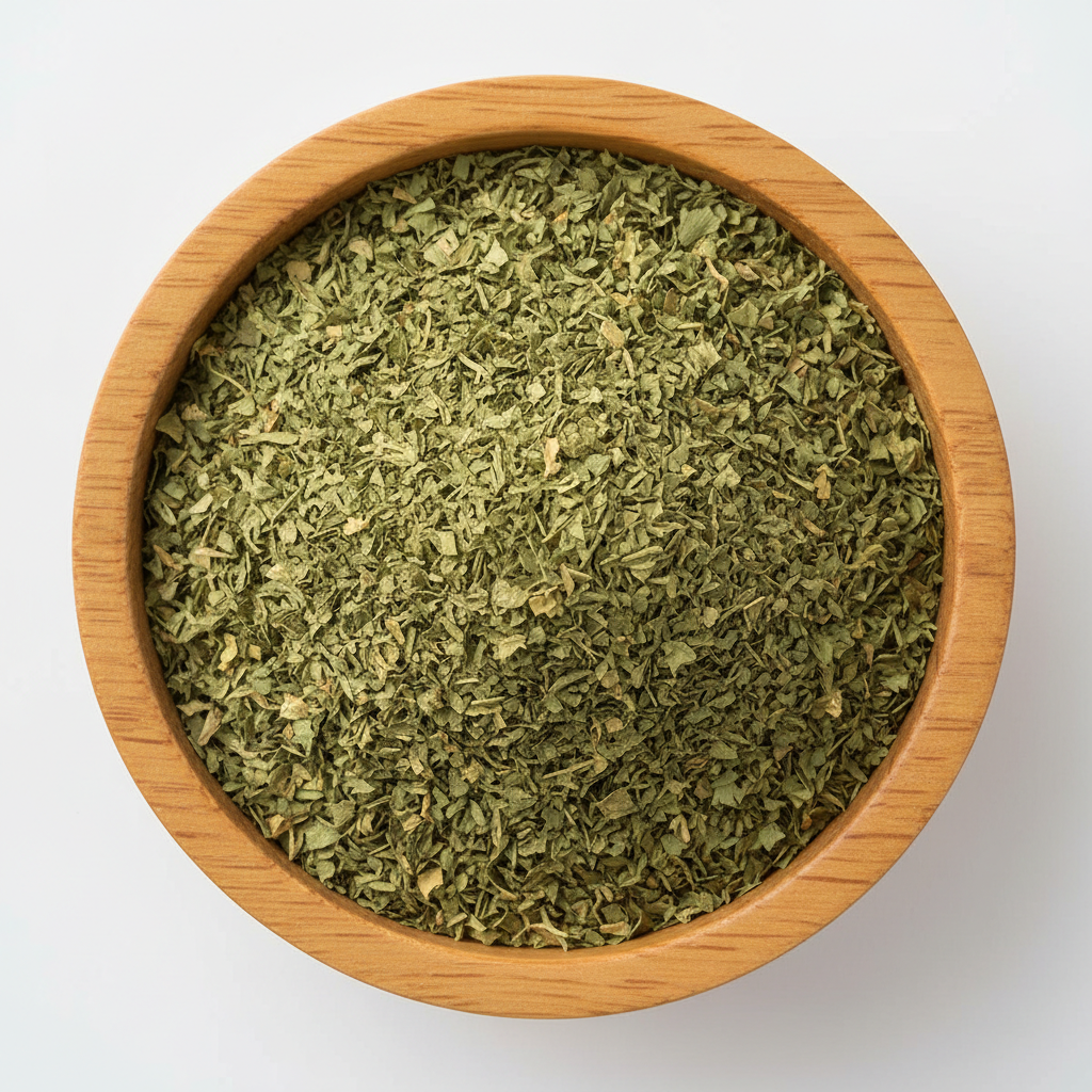 Dried Parsley in wooden circle bowl with white background, photo size is 556px in 556 px